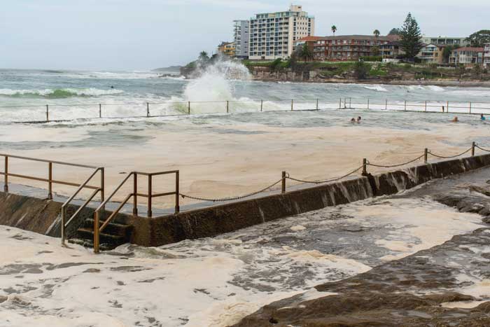 Too Much Rain In Your Pool Water? How to remove excess water and prepare your pool for a storm.